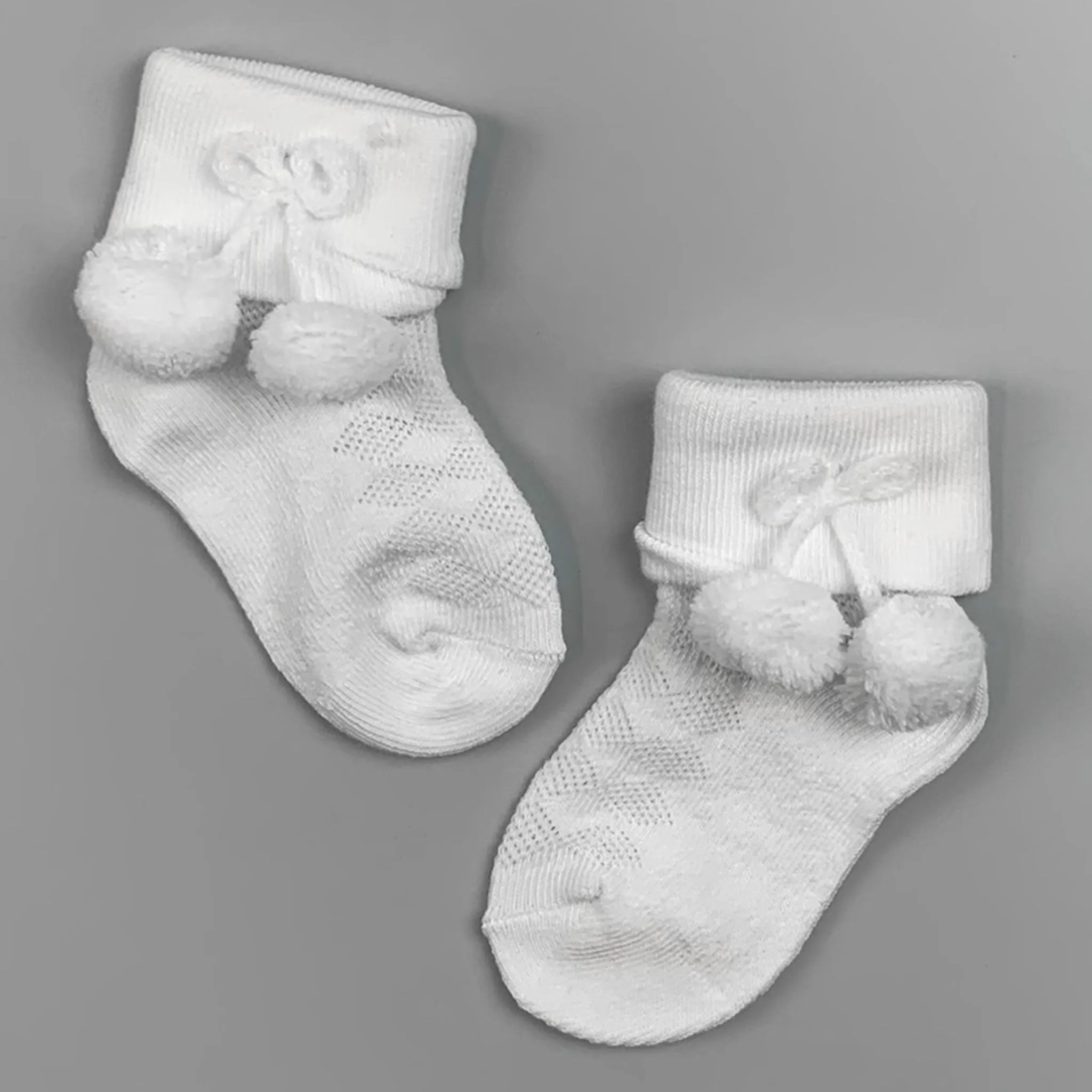 Unisex baby ankle socks with Pom Poms White