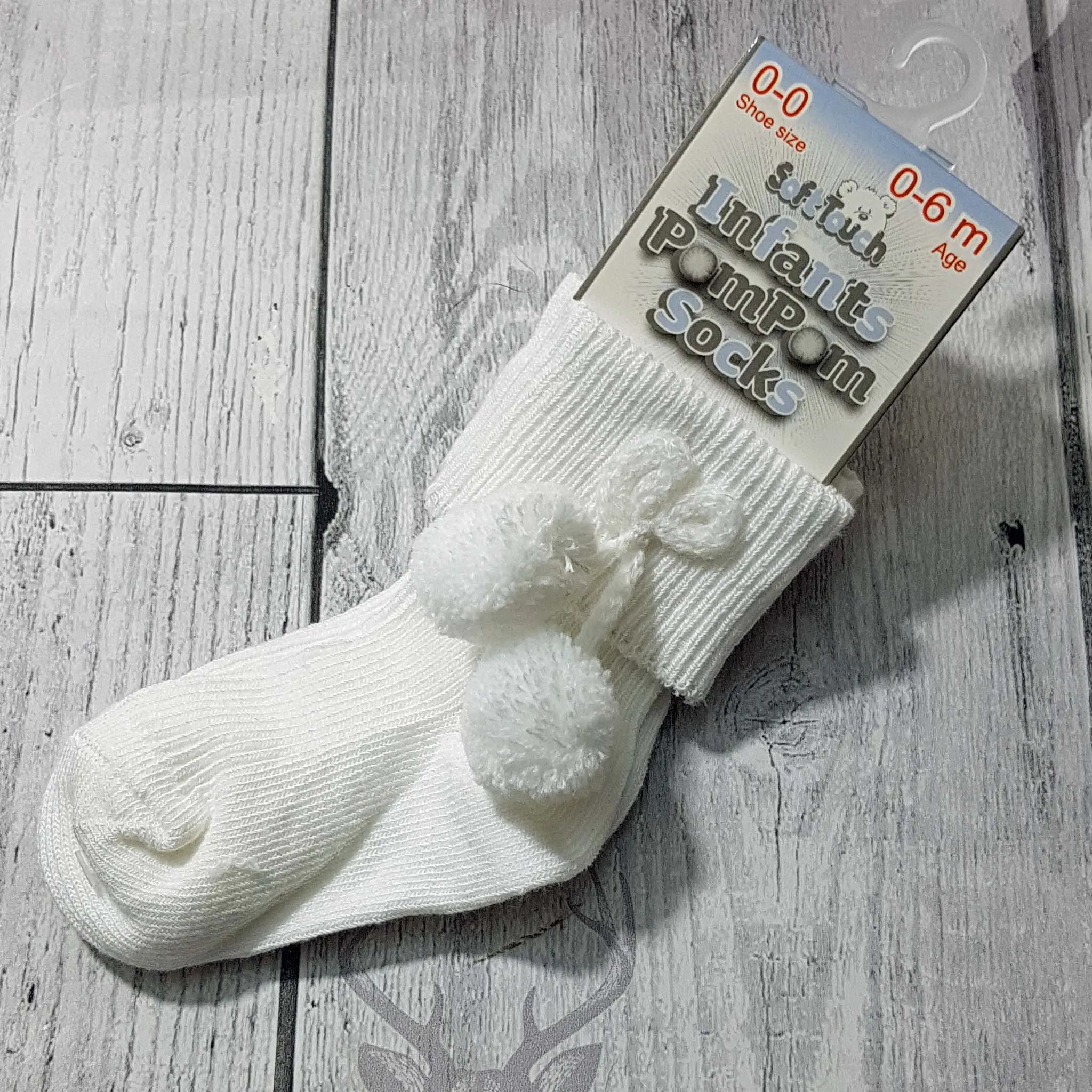 Unisex baby ankle socks with Pom Poms White